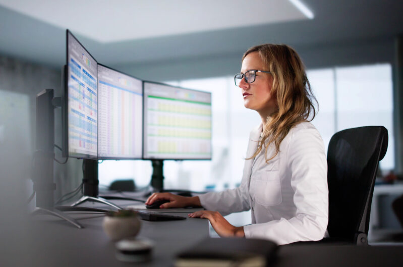 A physician on a computer